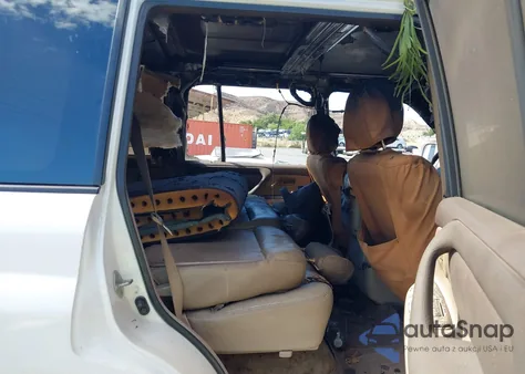 2000 Toyota Land Cruiser from USA, damaged, VIN JT3HT05J9Y0082581